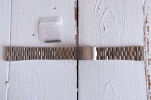 Bracelet Seiko maillons H en acier inoxydable, rare en taille 18mm. Fourni avec deux pompes 18mm.